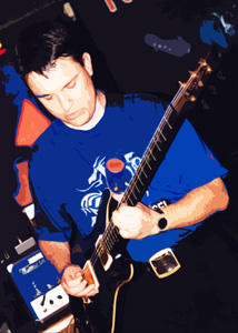 Simon Ashworth playing guitar